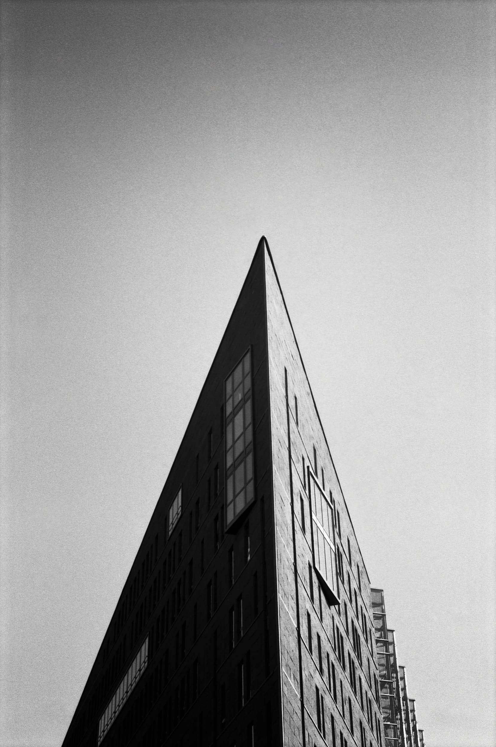 Minimal architecture photography: modern office building with geometric composition.