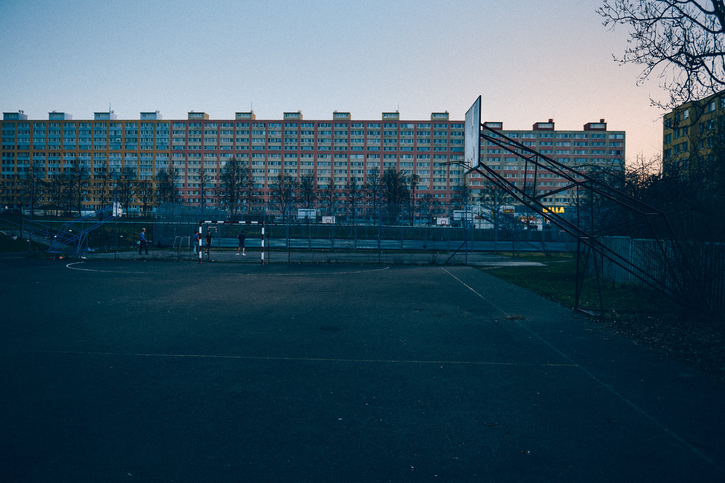 Concrete basketball court on an old housing estate.