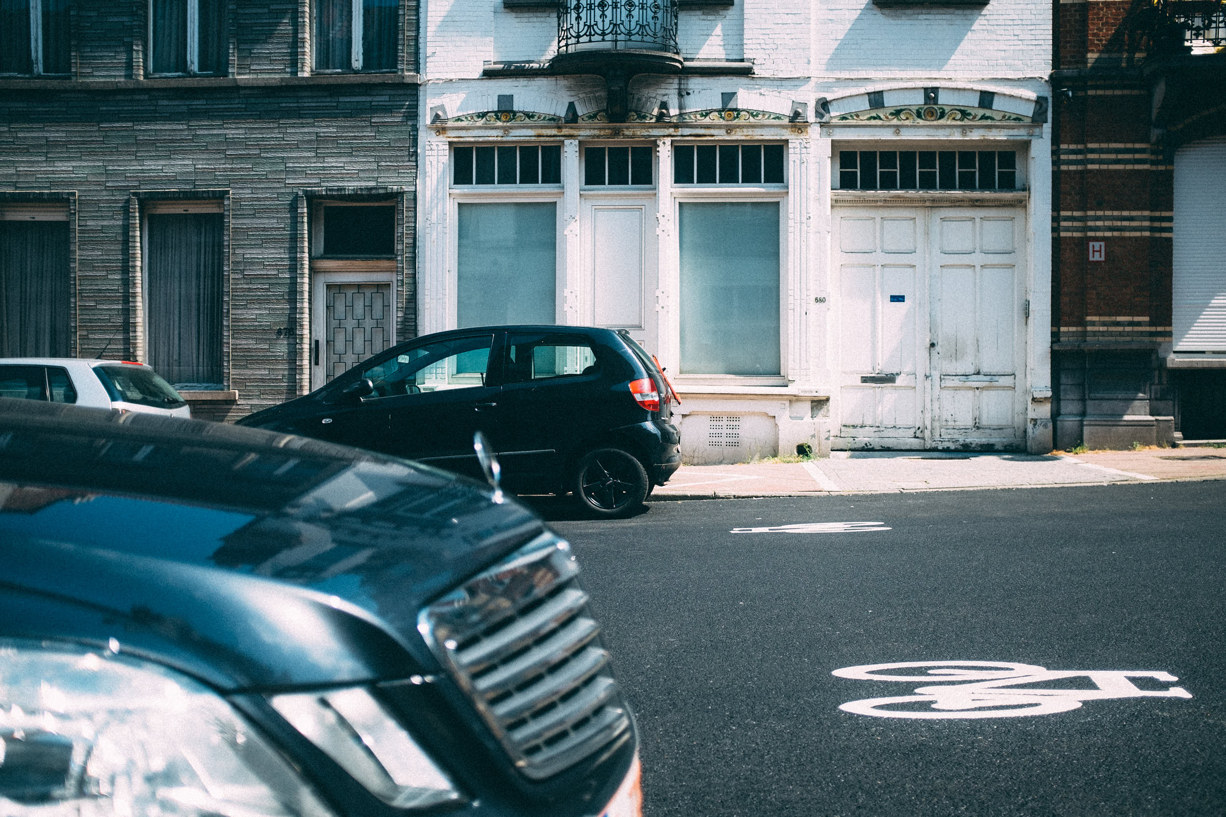 Travel photography: cars parked on the street of Brussels, Belgium.