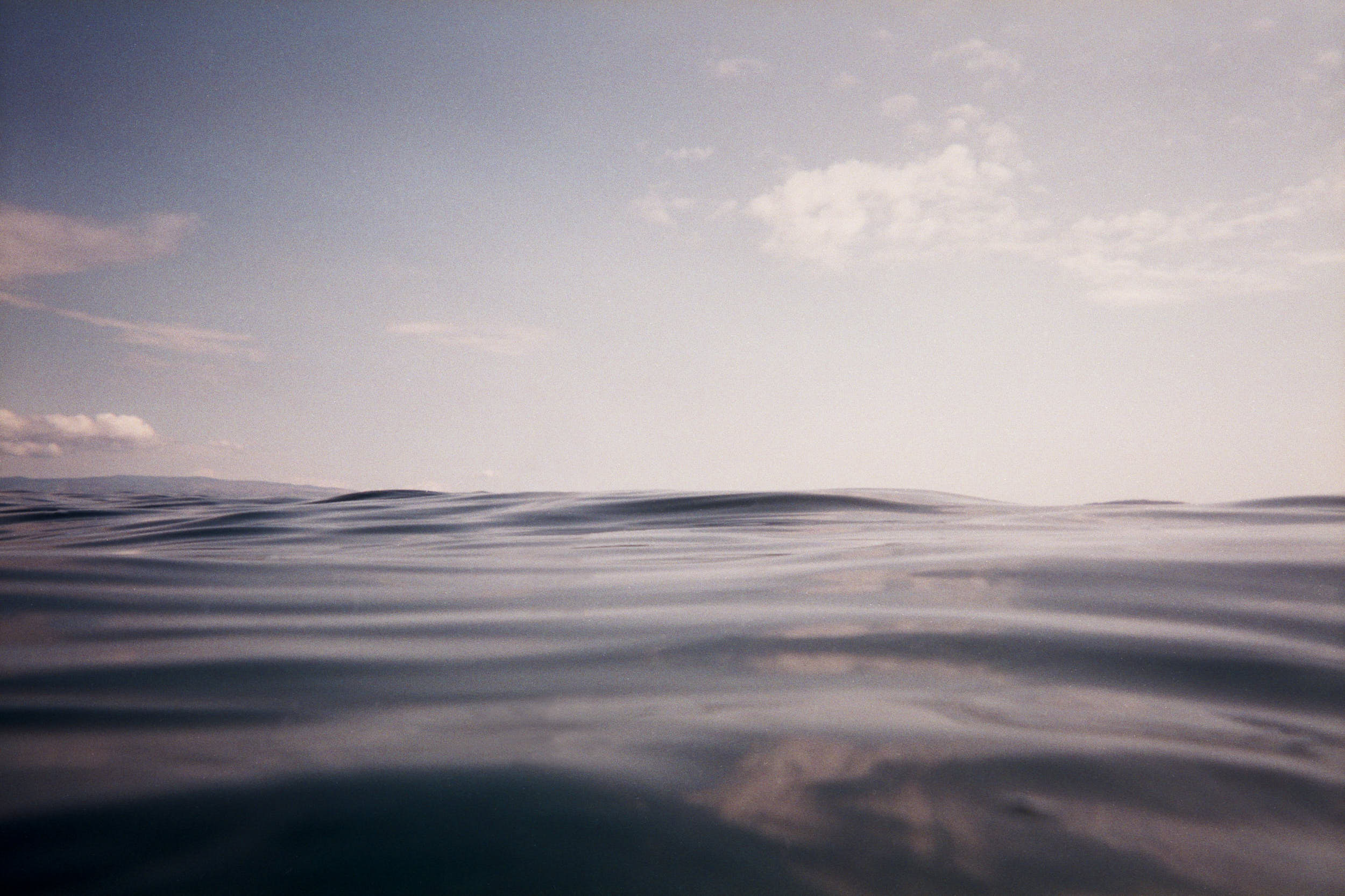 Minimal blue seascape photographed from the water level.